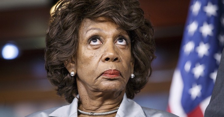 Rep. Maxine Waters, D-Calif., listens to comments by House Minority Whip Steny Hoyer of Md., as she and fellow Democrats criticize the efforts of Republicans to muscle legislation throu