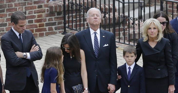 Vice President Joe Biden, center, pauses alongside his family as they to enter a visitation for his son, former Delaware Attorney General Beau Biden, Thursday, June 4, 2015, at Legislat