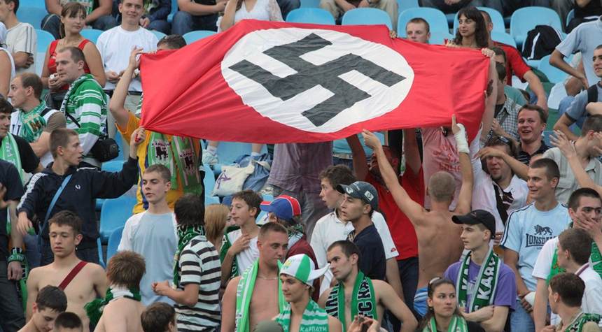 Do those protesting the NAZI flag at Sanders’ rally really know what it stood for?