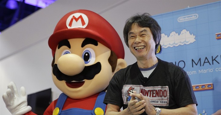 FILE - In this June 11, 2014 file photo, Japanese video game designer Shigeru Miyamoto introduces the Nintendo's Mario Maker during a press event at the Nintendo booth at the Electronic