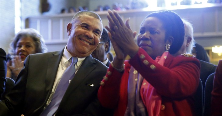 U.S. Rep. William Lacy Clay, D-Mo., left, smiles along side fellow Congressional Black Caucus member Rep. Shelia Jackson-Lee, D-Texas, during a service at Wellspring Church, Sunday, Jan