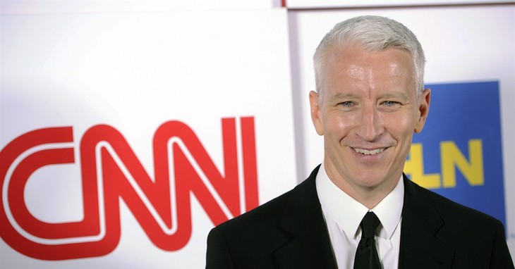 FILE - In this Jan. 10, 2014 file photo, Anderson Cooper of CNN poses at the CNN Worldwide All-Star Party in Pasadena, Calif. CNN has joined Fox News Channel in saying that it was mista