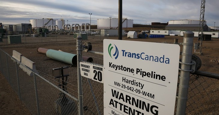 A sign is posted in front of TransCanada's Keystone pipeline facilities in Hardisty, Alberta, Canada, on Friday, Nov. 6, 2015. Following the Obama administration’s rejection of the Key