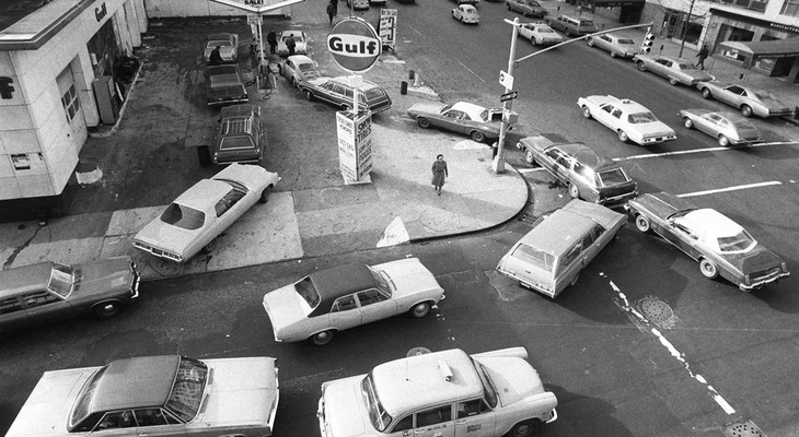 FILE - In this Dec. 23, 1973, file photo, cars line up in two directions at a gas station in New York City. Of all the bad memories seared into the American consciousness from the early