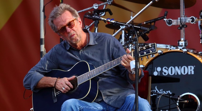 Eric Clapton is against vaccine mandates so of course he's being called a racist now