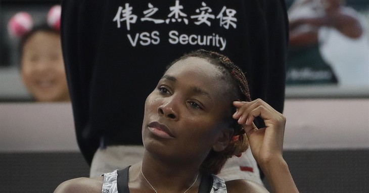 Venus Williams of the United States is seated during a break in her women's singles against Peng Shuai of China at the China Open tennis tournament at the National Tennis Stadium in Bei