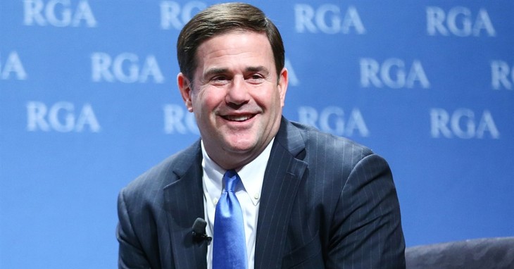 FILE - In this Nov. 18, 2015 file photo, Arizona Gov. Doug Ducey participates in a panel discussion during the Republican Governors Association annual conference in Las Vegas. Ducey lau