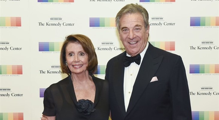 Rep. Nancy Pelosi, D-Calif., and her husband, Paul Pelosi arrive at the State Department for the Kennedy Center Honors gala dinner on Saturday, Dec. 3, 2016 in Washington. (AP Photo/Kev