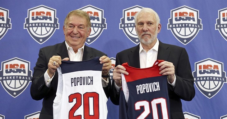 FILE - In this Oct. 23, 2015, file photo, USA Basketball Chairman Jerry Colangelo, left, and Spurs and Team USA head coach Gregg Popovich hold jerseys after a news conference at the Spu