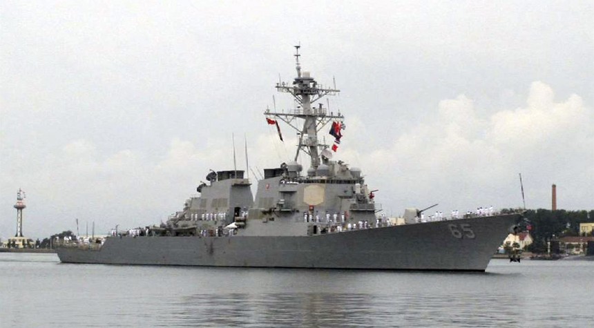 China claims to run U.S. warship out of South China Sea