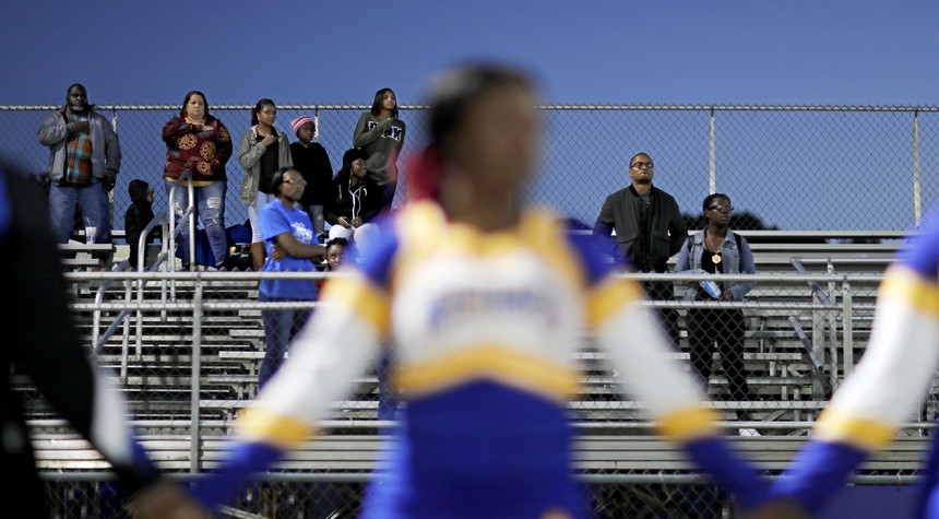 Watch: Mother Tased & Arrested for Not Wearing a Mask at Son's Middle School Football Game