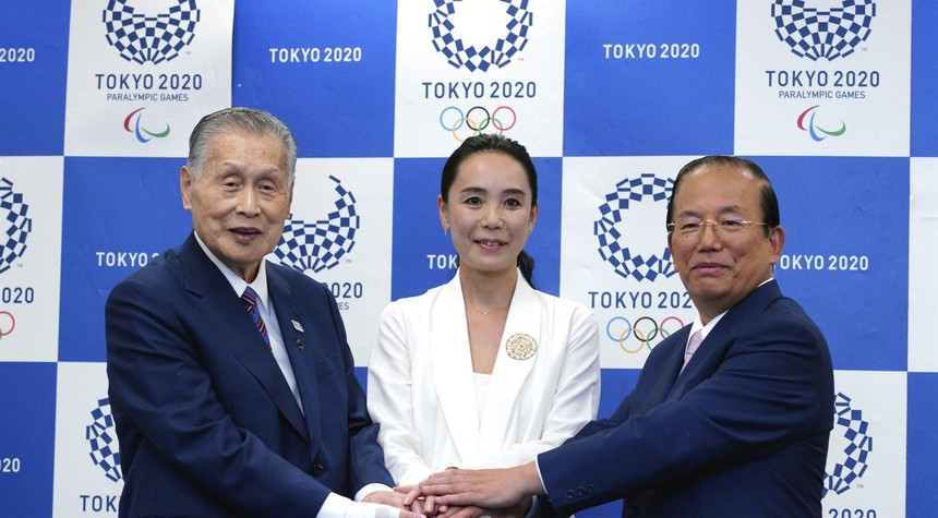Tokyo declares another COVID emergency just as IOC official arrives