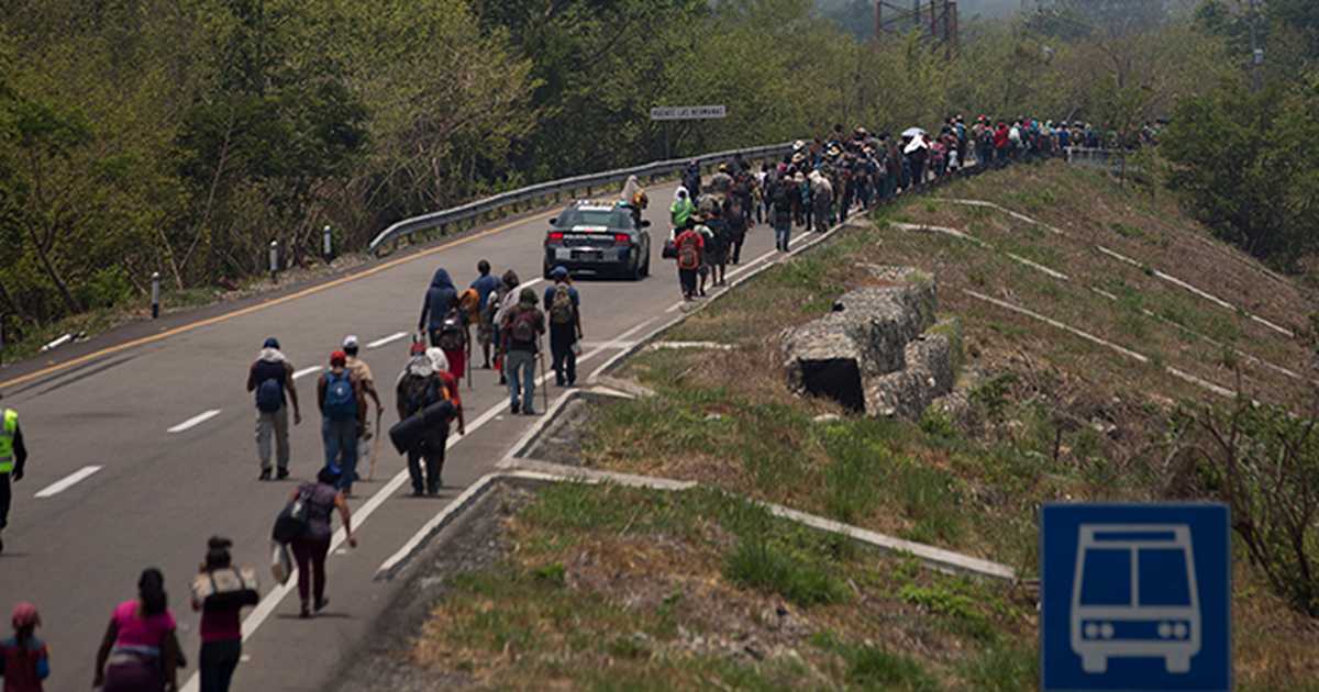 Large Group of Migrants Arrive at Southern Border Wearing Biden Campaign T-Shirts With Two Demands for Joe - Vimarsana News