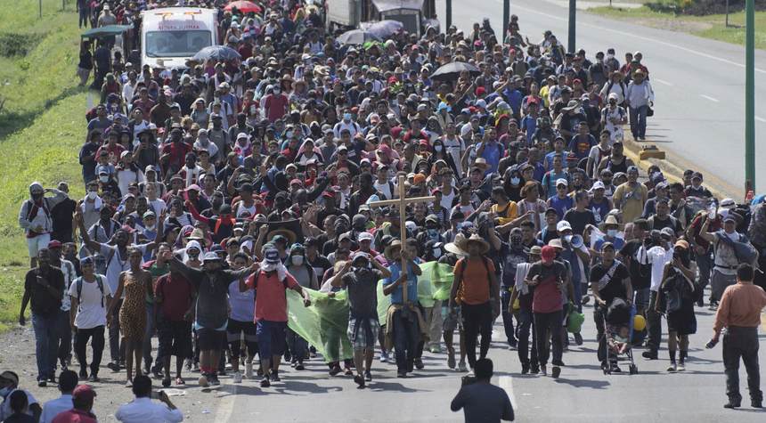 Mexico "dissolves" migrant caravan with travel documents