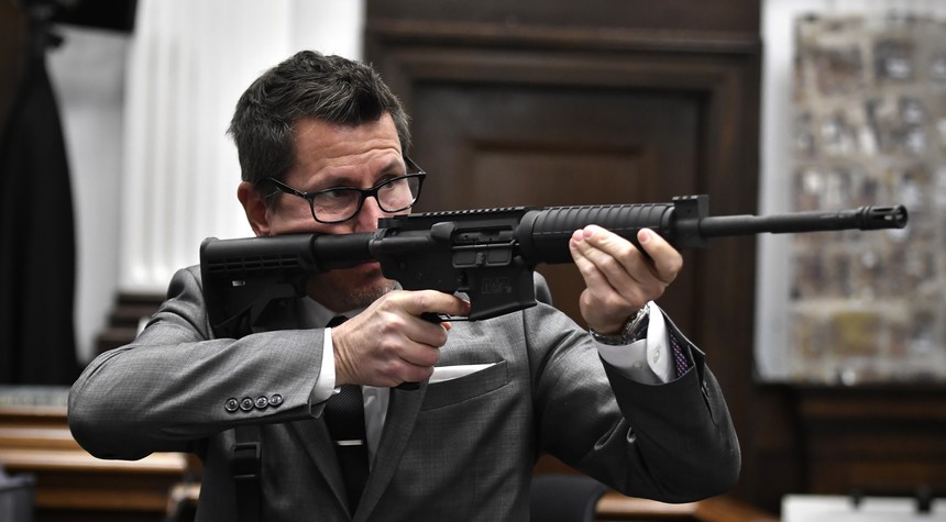 WHOA: Rittenhouse Prosecutor Thomas Binger Aims AR-15 at People in Courtroom, Finger on the Trigger